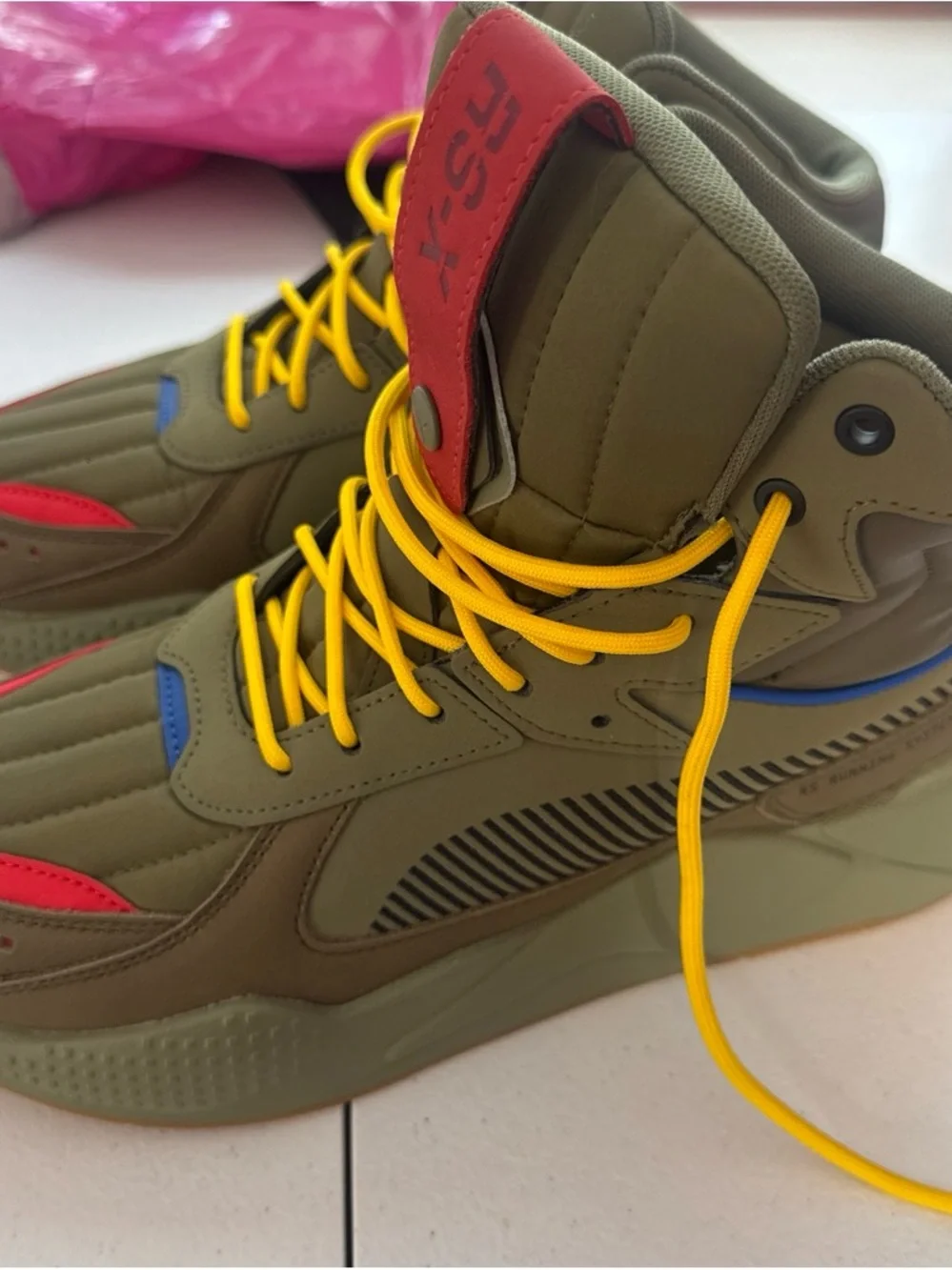 Puma Olive High-Top Boots with Yellow Laces and Red Accents